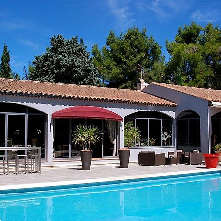 Hotel Les Mazets Des Roches Tarascon Bagian luar foto